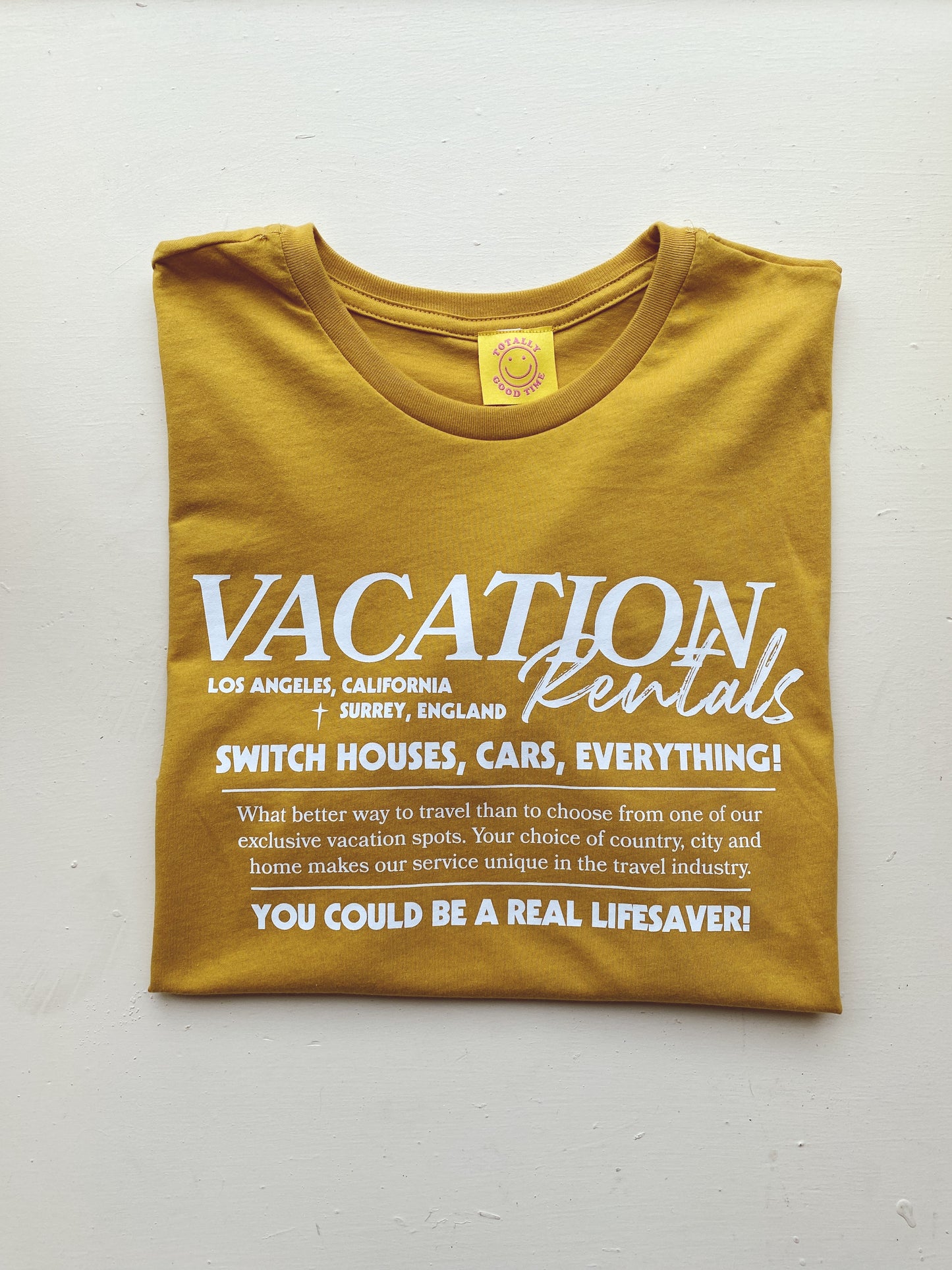 The Holiday Vacation Tee