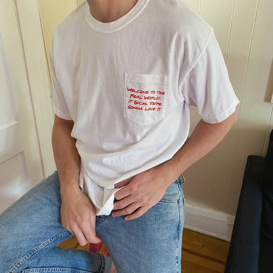 Friends Welcome to the Real World It Sucks Pocket Tee - Totally Good Time